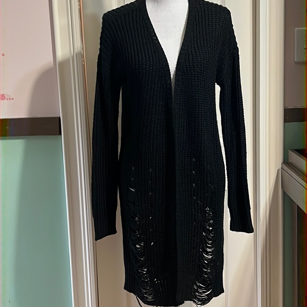 Black long sweater with stylish torn strips